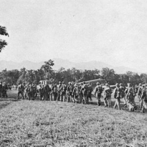 32D Division Soldiers board aircraft at Dobodura Airstrip on 4 February 1943 for the flight to Port Moresby. There they would board ships for the trip back to Australia